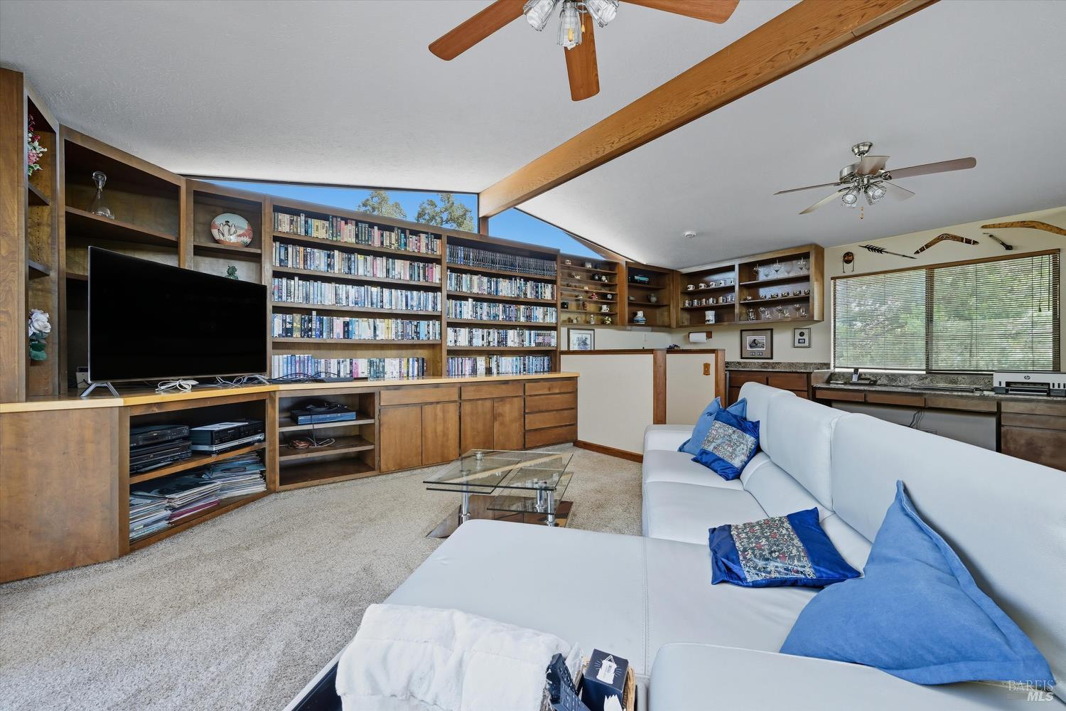 2487 Olivet Road Santa Rosa, CA 95401 - Photo 21 of 48 a living room with furniture and a flat screen tv