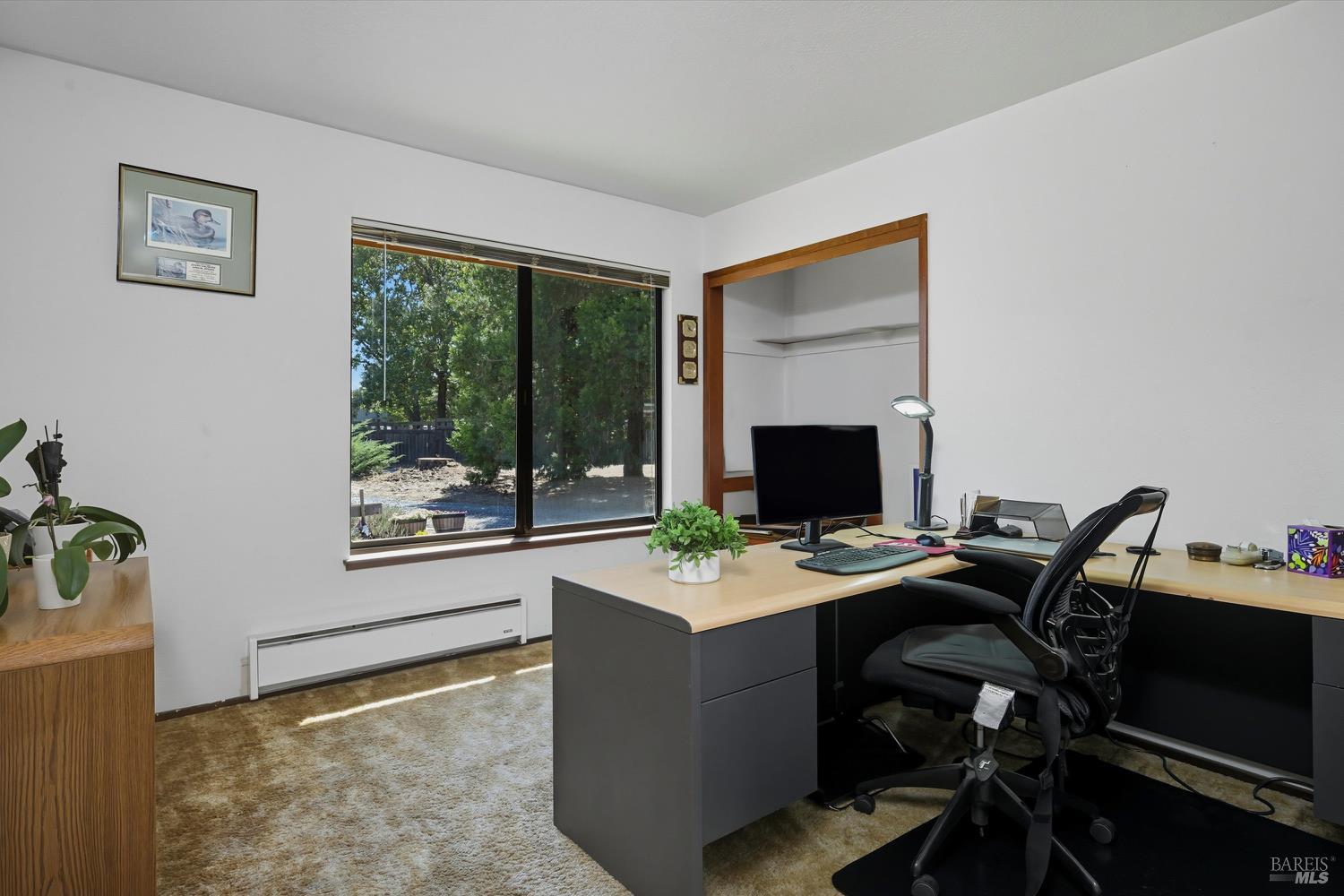 2487 Olivet Road Santa Rosa, CA 95401 - Photo 26 of 48 a view of a workspace with furniture and a window