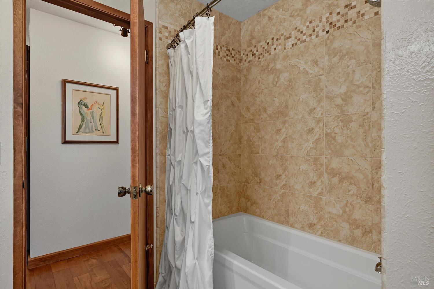 2487 Olivet Road Santa Rosa, CA 95401 - Photo 27 of 48 a bathroom with a shower and a bath tub