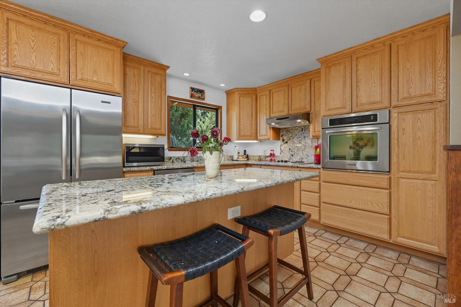 2487 Olivet Road Santa Rosa, CA 95401 - Photo 7 of 48 a kitchen with stainless steel appliances granite countertop a refrigerator a stove a sink and a cabinets