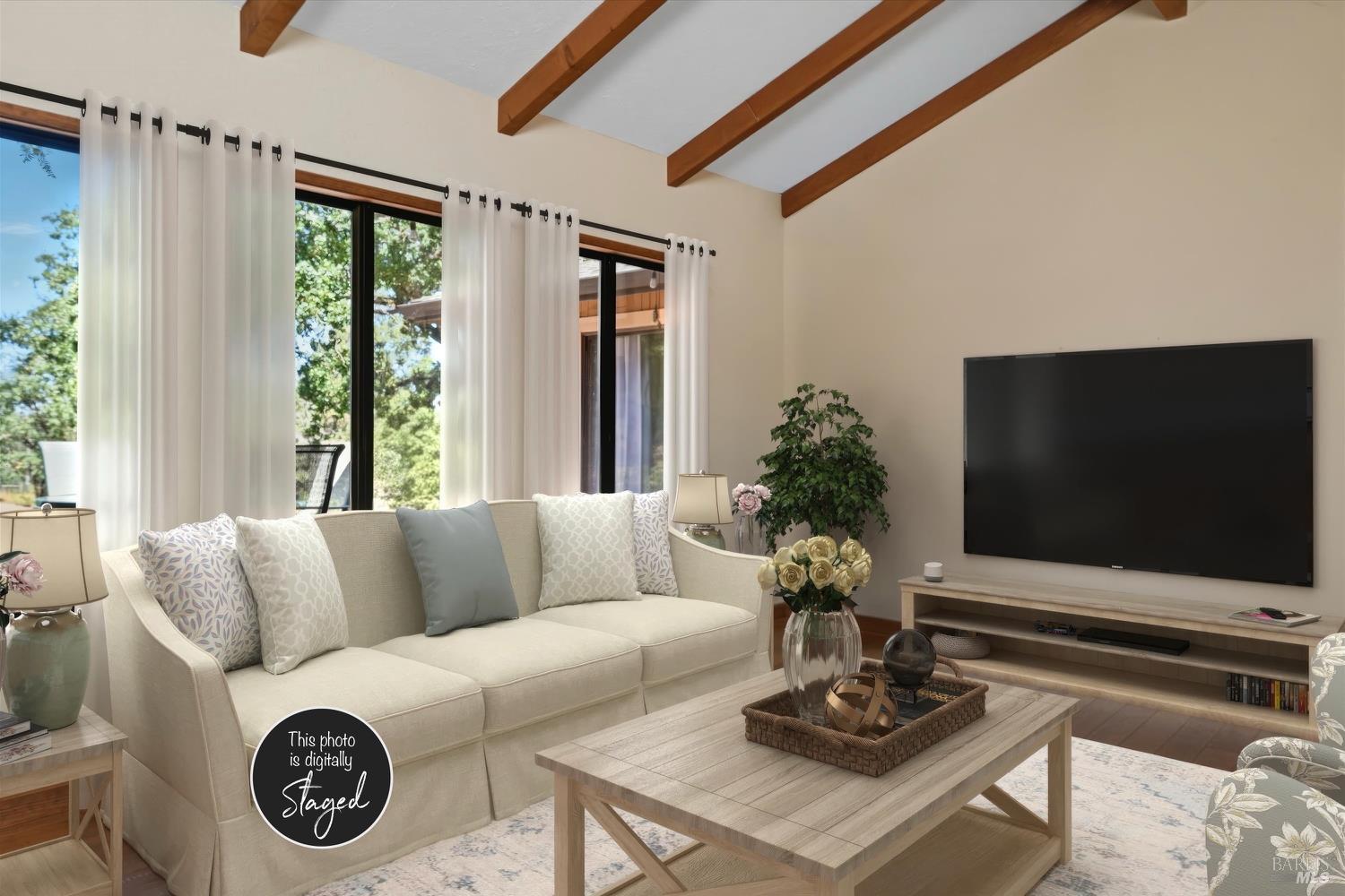 2487 Olivet Road Santa Rosa, CA 95401 - Photo 10 of 45 a living room with furniture and a flat screen tv