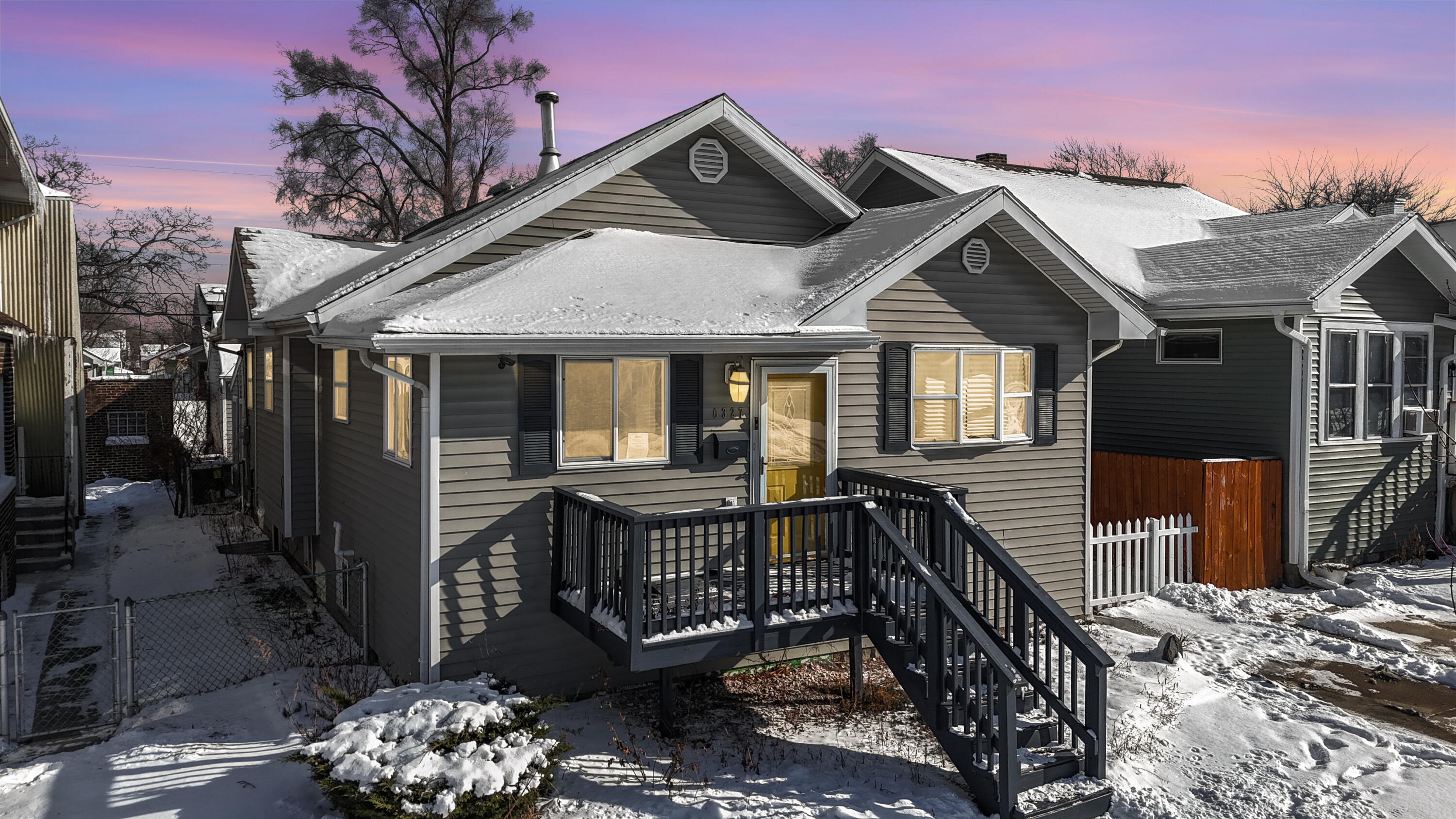 a front view of a house with a porch