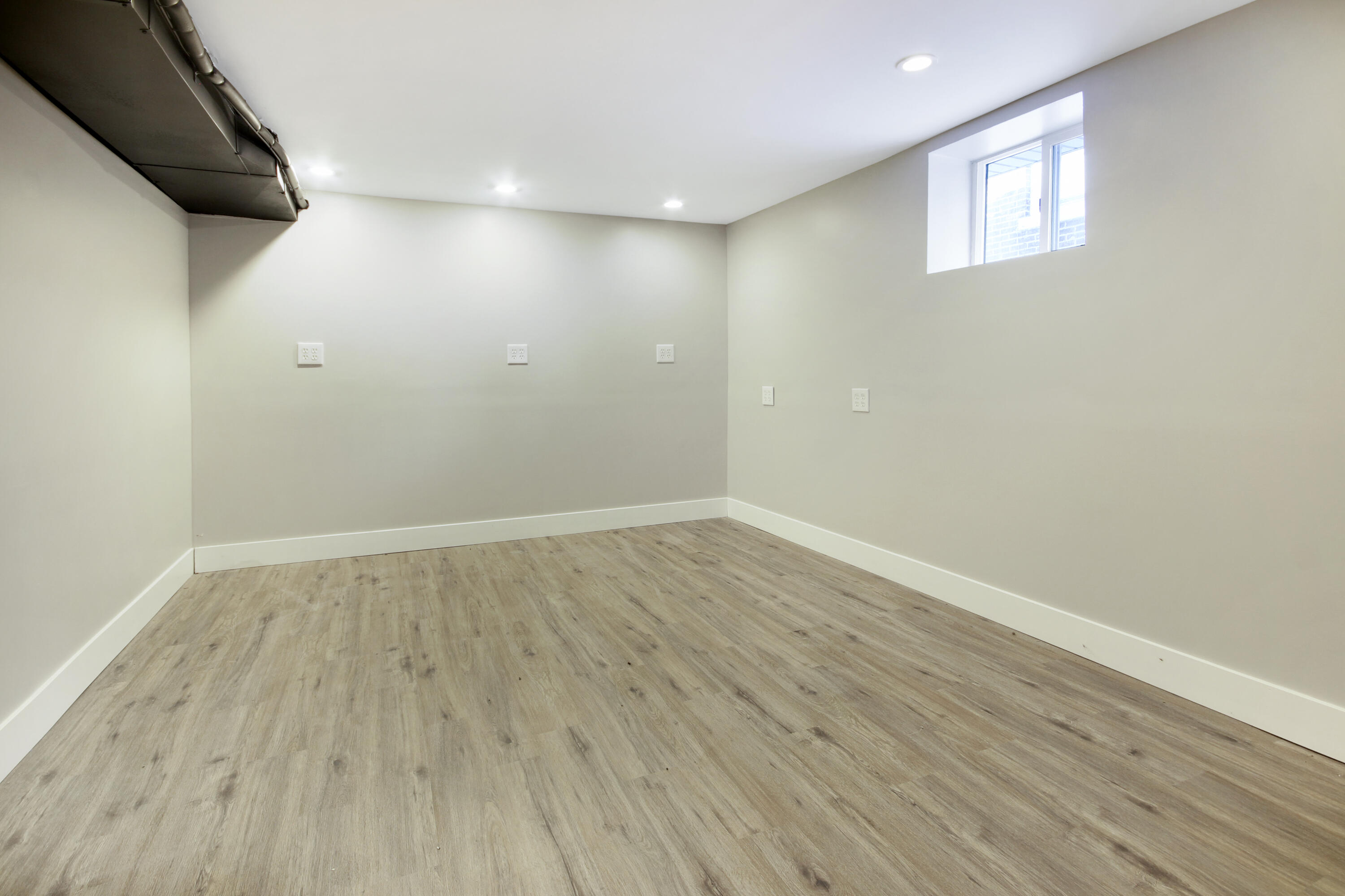 6327 Garfield Avenue Hammond, IN 46324 - Photo 12 of 20 a view of an empty room with wooden floor and a window