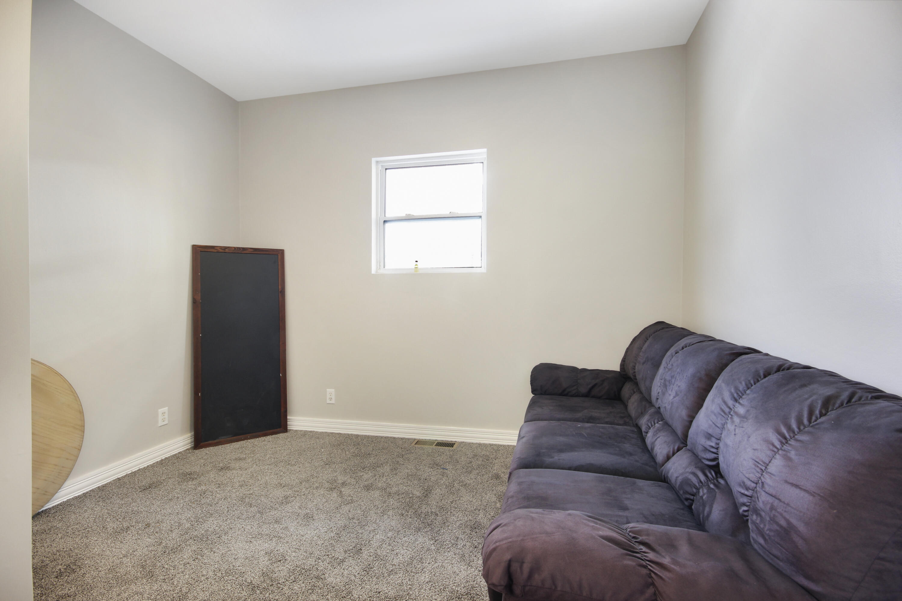 6327 Garfield Avenue Hammond, IN 46324 - Photo 7 of 20 a living room with furniture and a window