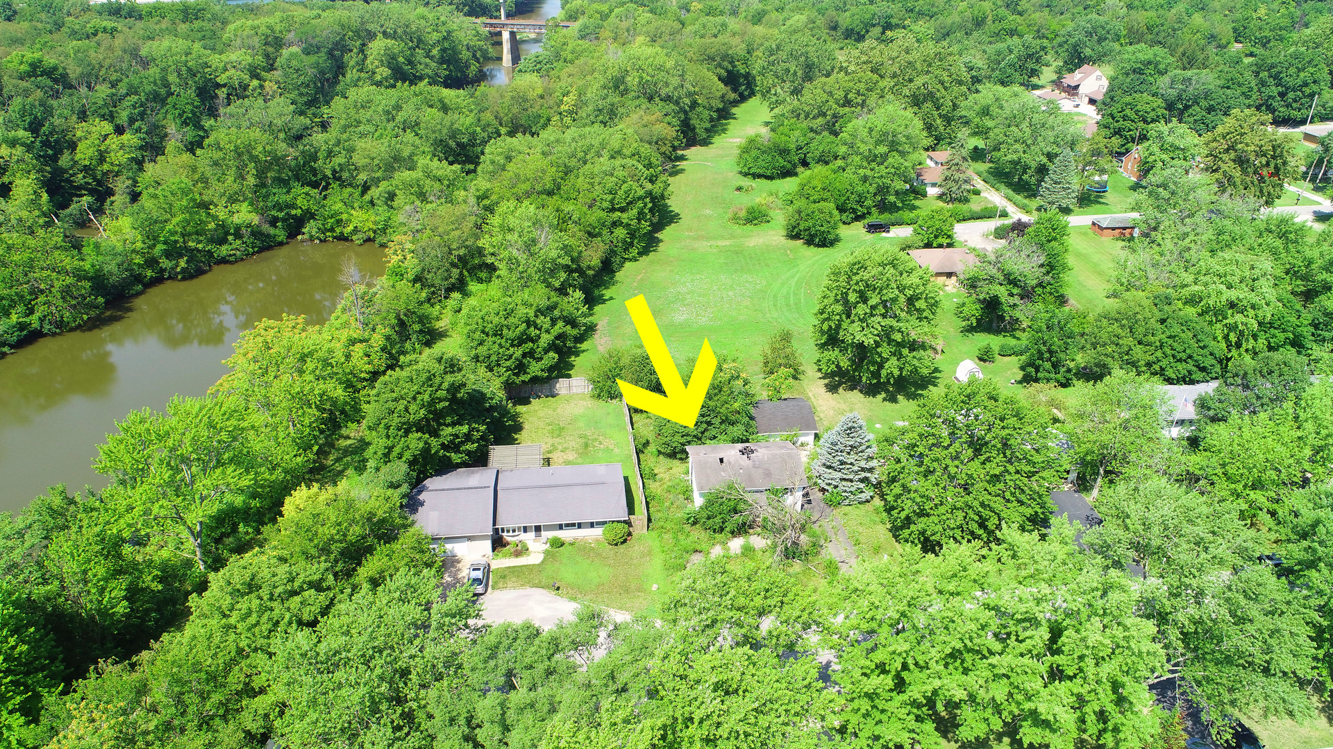 1840 Jacobs Street Streator, IL 61364 - Photo 3 of 6 an aerial view of a house with a yard and lake view