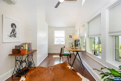 a kitchen with a refrigerator and a sink