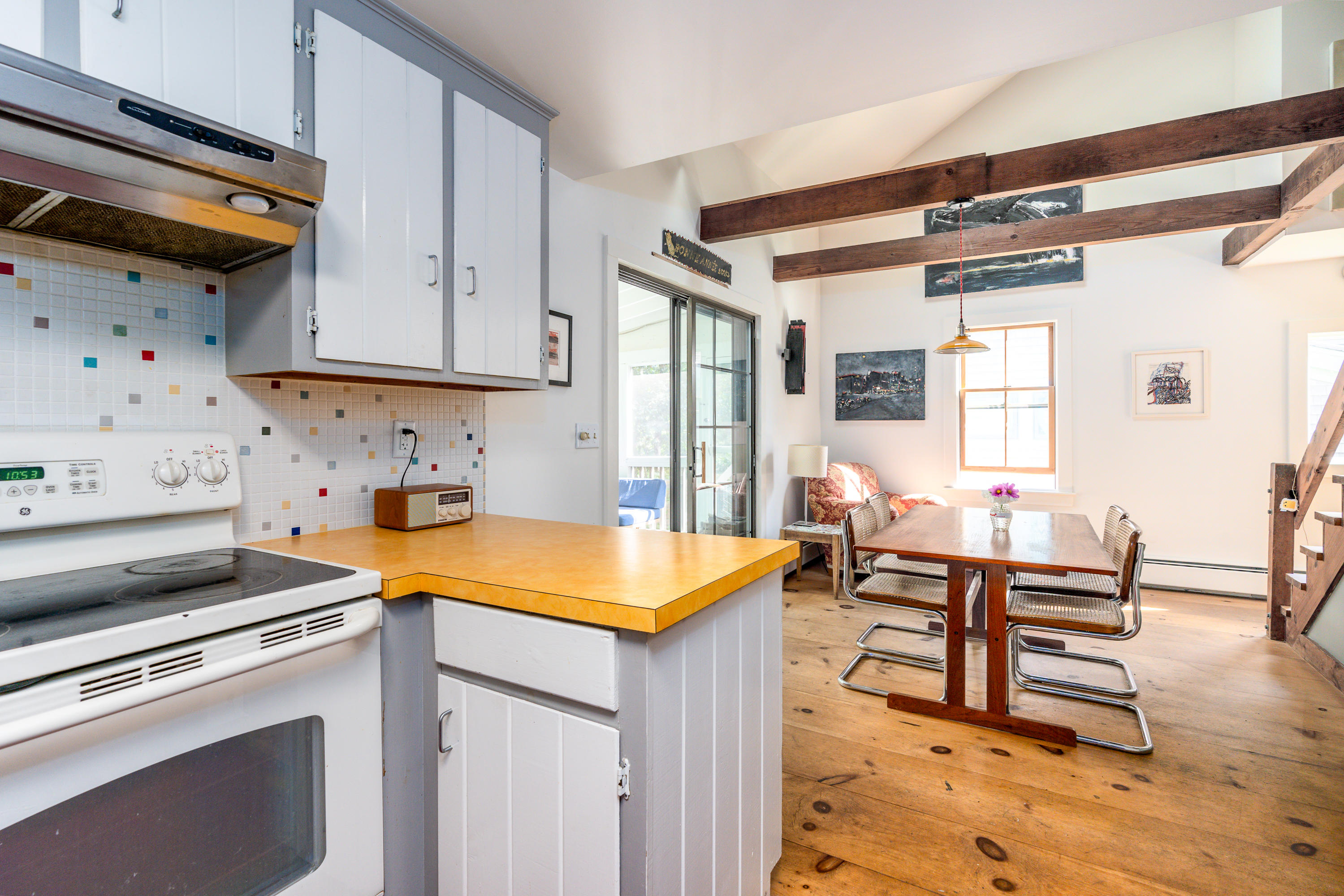 16 Meadow View Wellfleet, MA 02667 - Photo 11 of 36 a kitchen with stainless steel appliances granite countertop a stove a sink and a refrigerator
