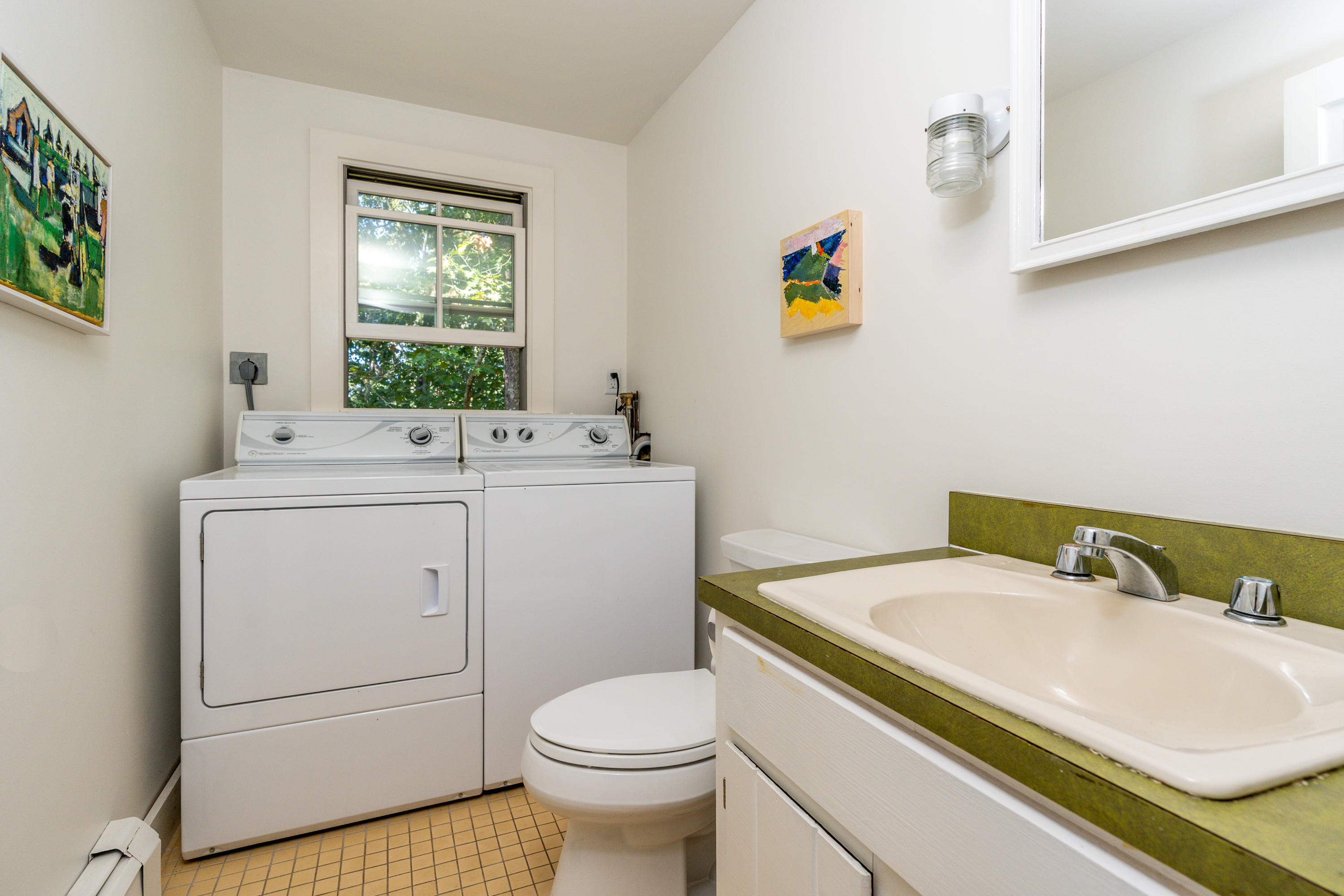 16 Meadow View Wellfleet, MA 02667 - Photo 12 of 36 a bathroom with a sink toilet and window