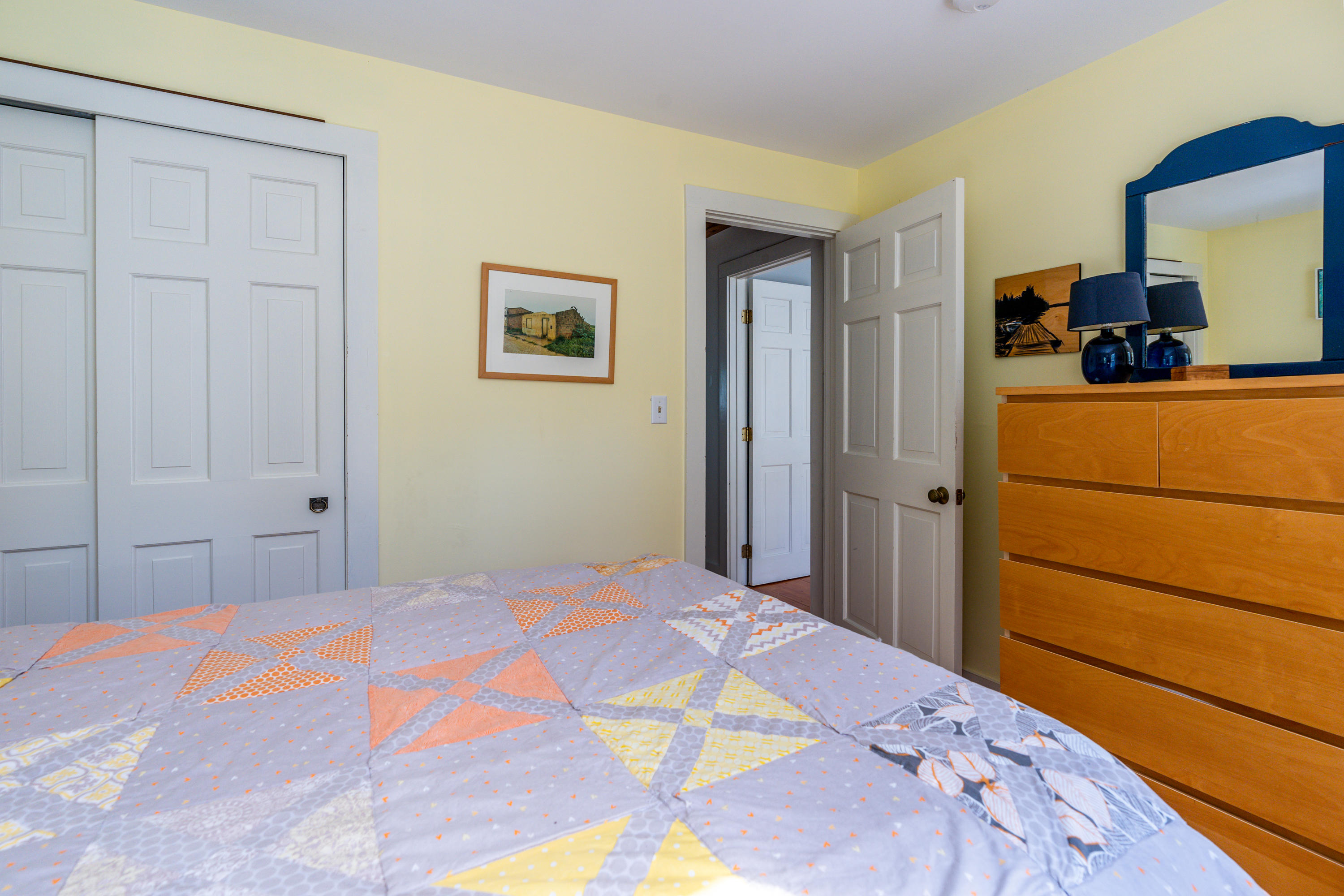 16 Meadow View Wellfleet, MA 02667 - Photo 20 of 36 a bedroom with a bed and a dresser
