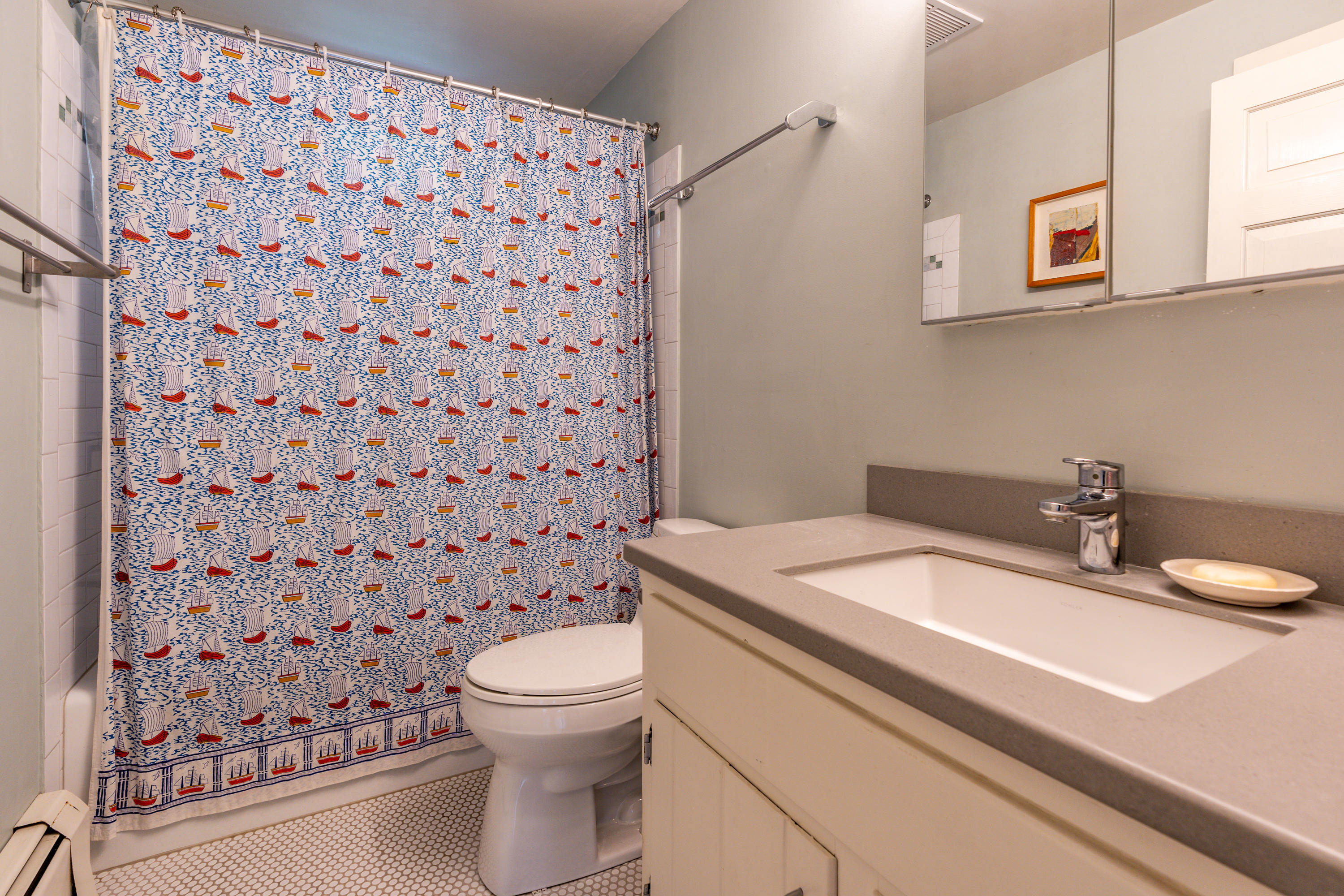 16 Meadow View Wellfleet, MA 02667 - Photo 22 of 36 a bathroom with a granite countertop sink a toilet and a mirror