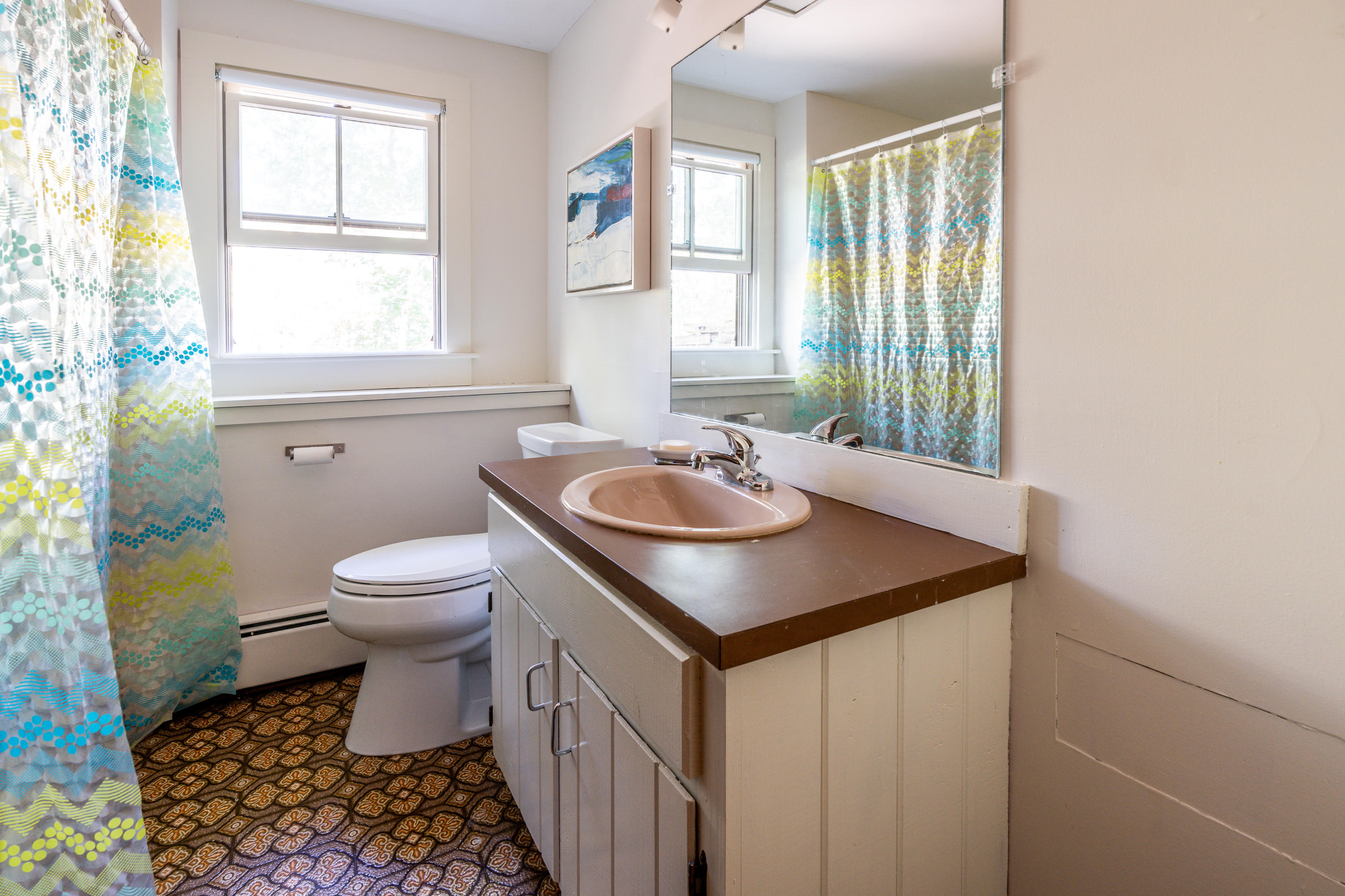 16 Meadow View Wellfleet, MA 02667 - Photo 25 of 36 a bathroom with a sink a toilet and a window