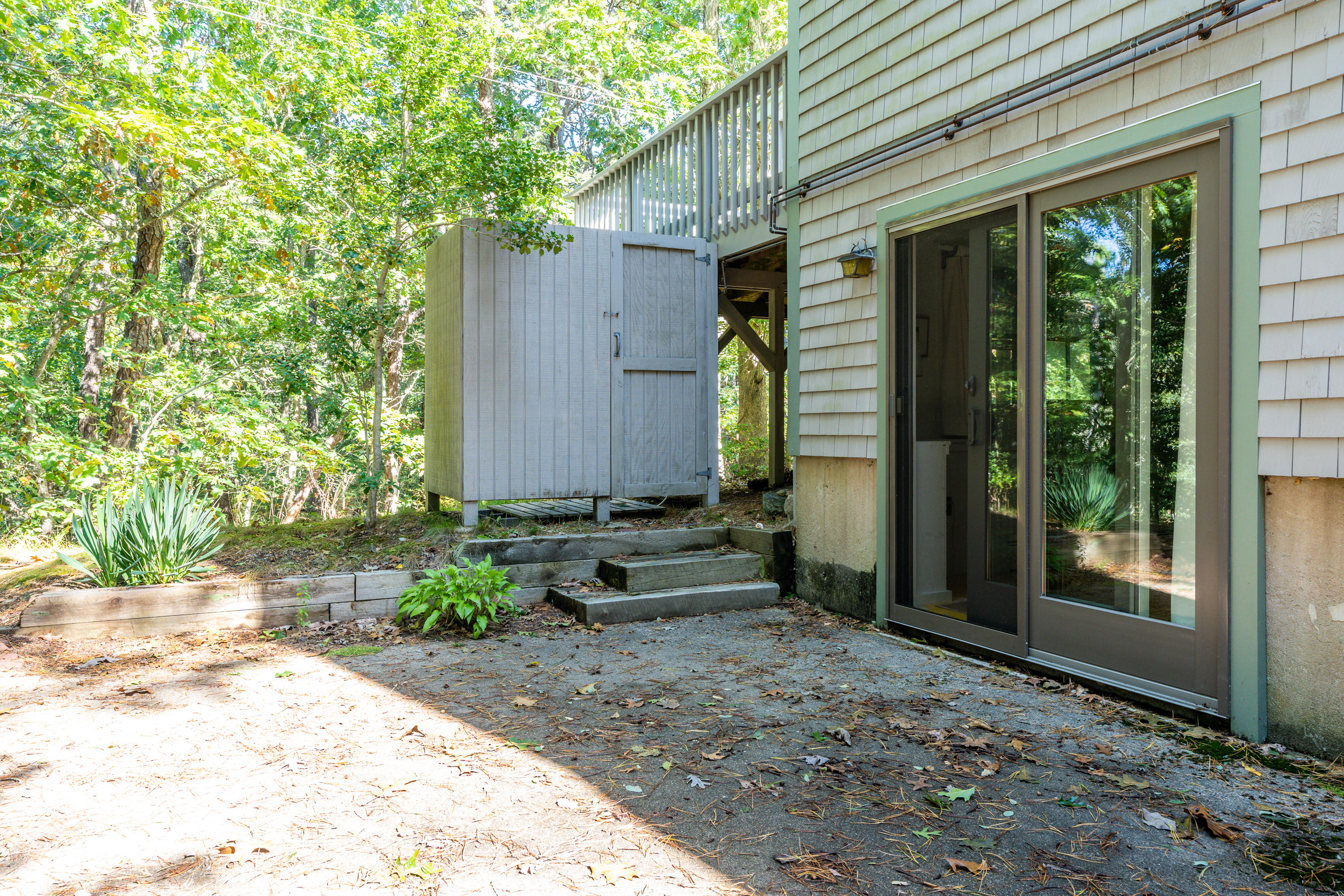 16 Meadow View Wellfleet, MA 02667 - Photo 26 of 36 a front view of a house with garden