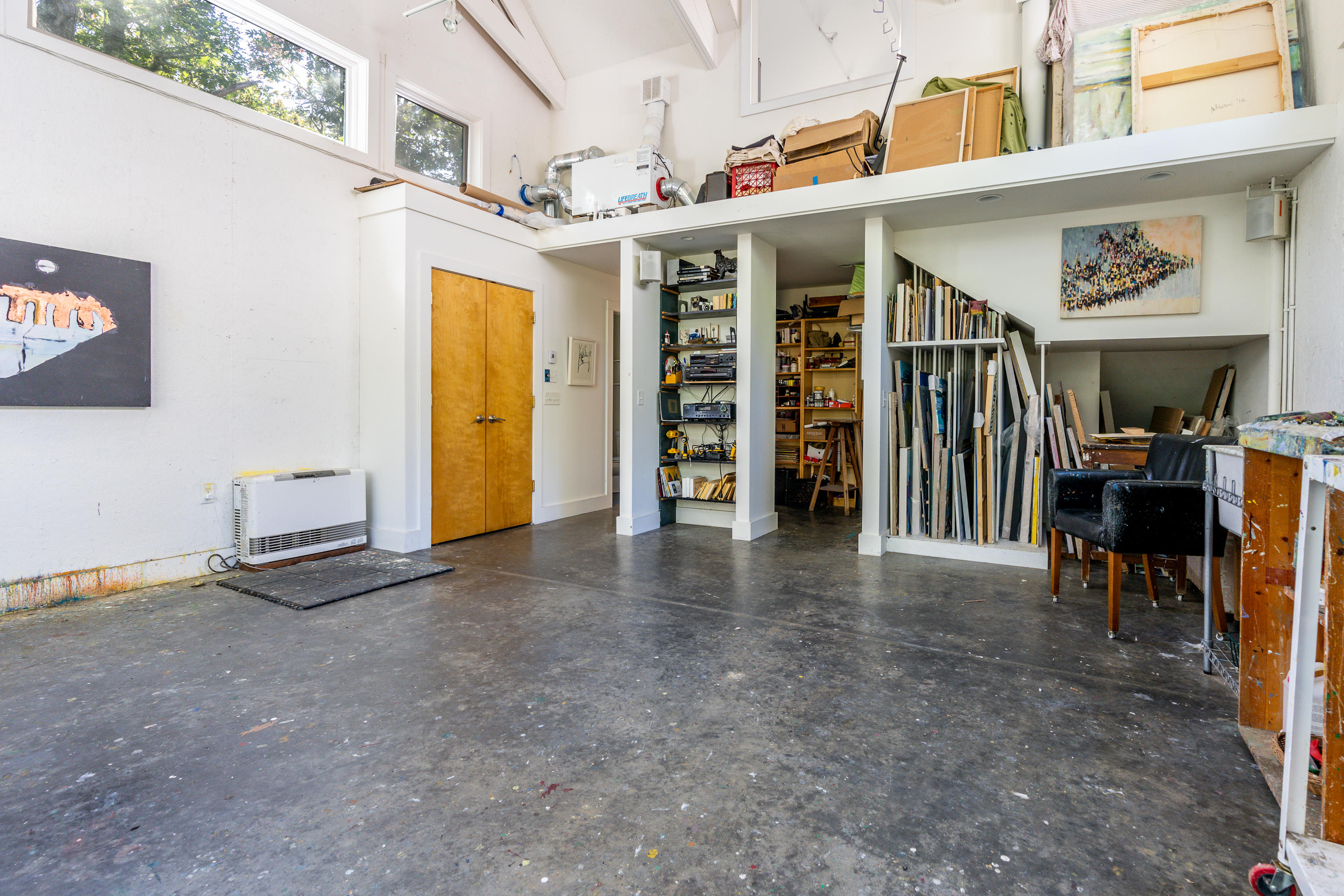 16 Meadow View Wellfleet, MA 02667 - Photo 29 of 36 a view of a building with glass door and furniture