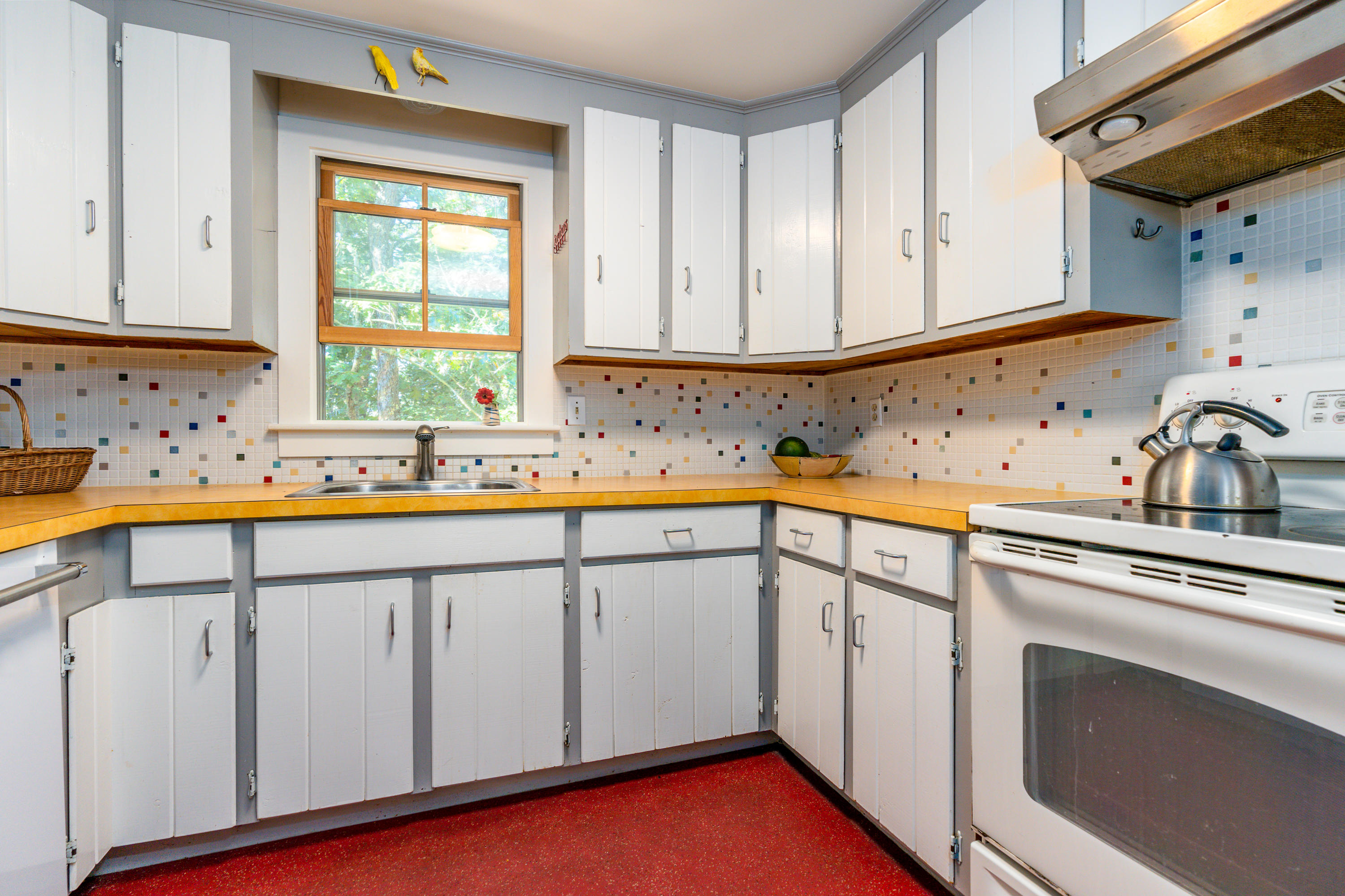 16 Meadow View Wellfleet, MA 02667 - Photo 10 of 36 a kitchen with a sink and cabinets