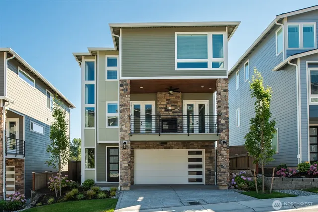 a view of a building with a window and palm tree