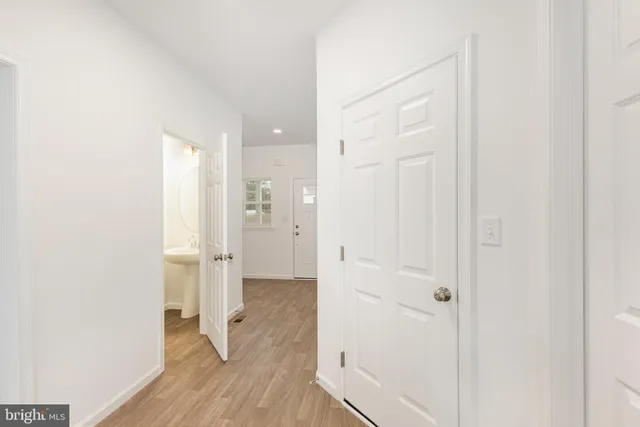 a view of bathroom with a shower and a sink