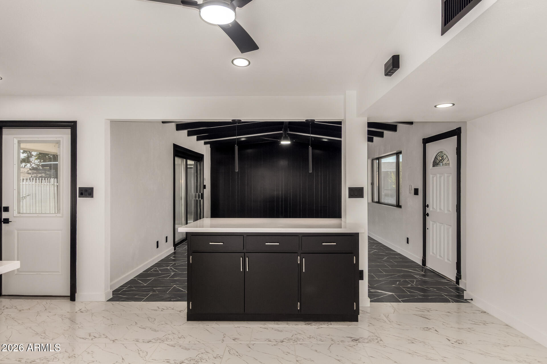 3001 West Ocotillo Road Phoenix, AZ 85017 - Photo 12 of 42 a living room with stainless steel appliances kitchen island granite countertop a refrigerator and a microwave oven