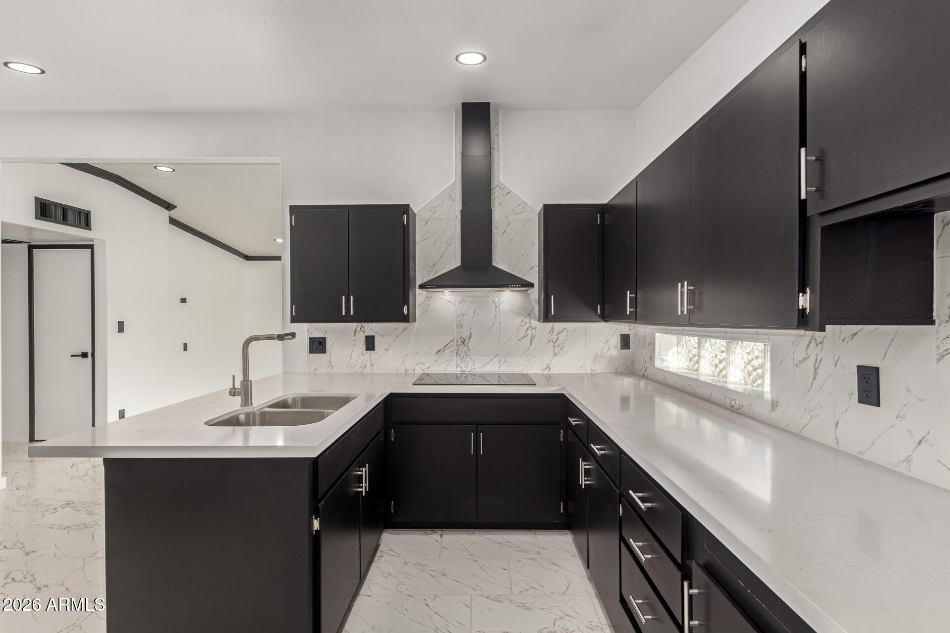 3001 West Ocotillo Road Phoenix, AZ 85017 - Photo 16 of 42 a kitchen with stainless steel appliances a sink and a stove