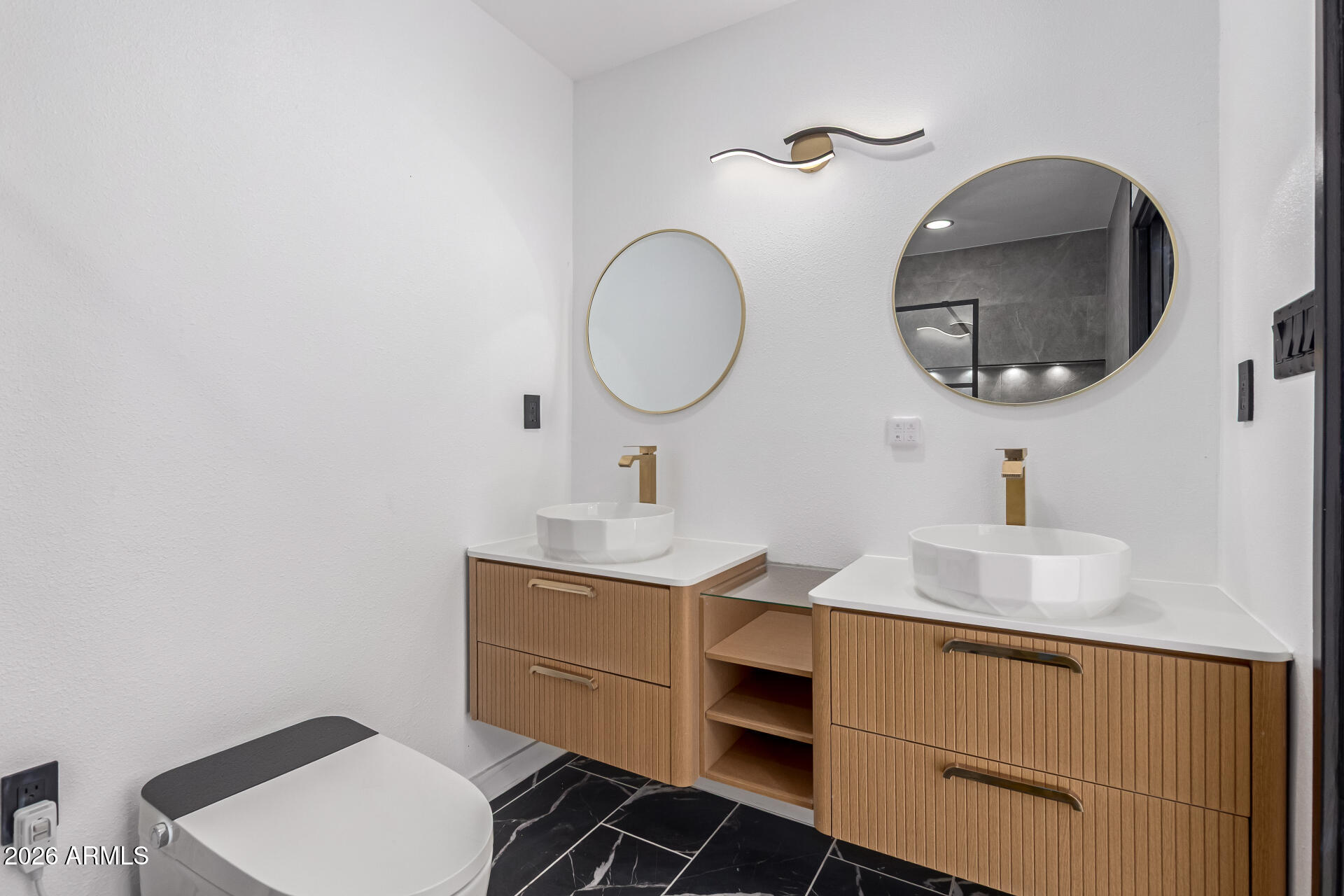 3001 West Ocotillo Road Phoenix, AZ 85017 - Photo 22 of 42 a bathroom with a toilet a sink and mirror