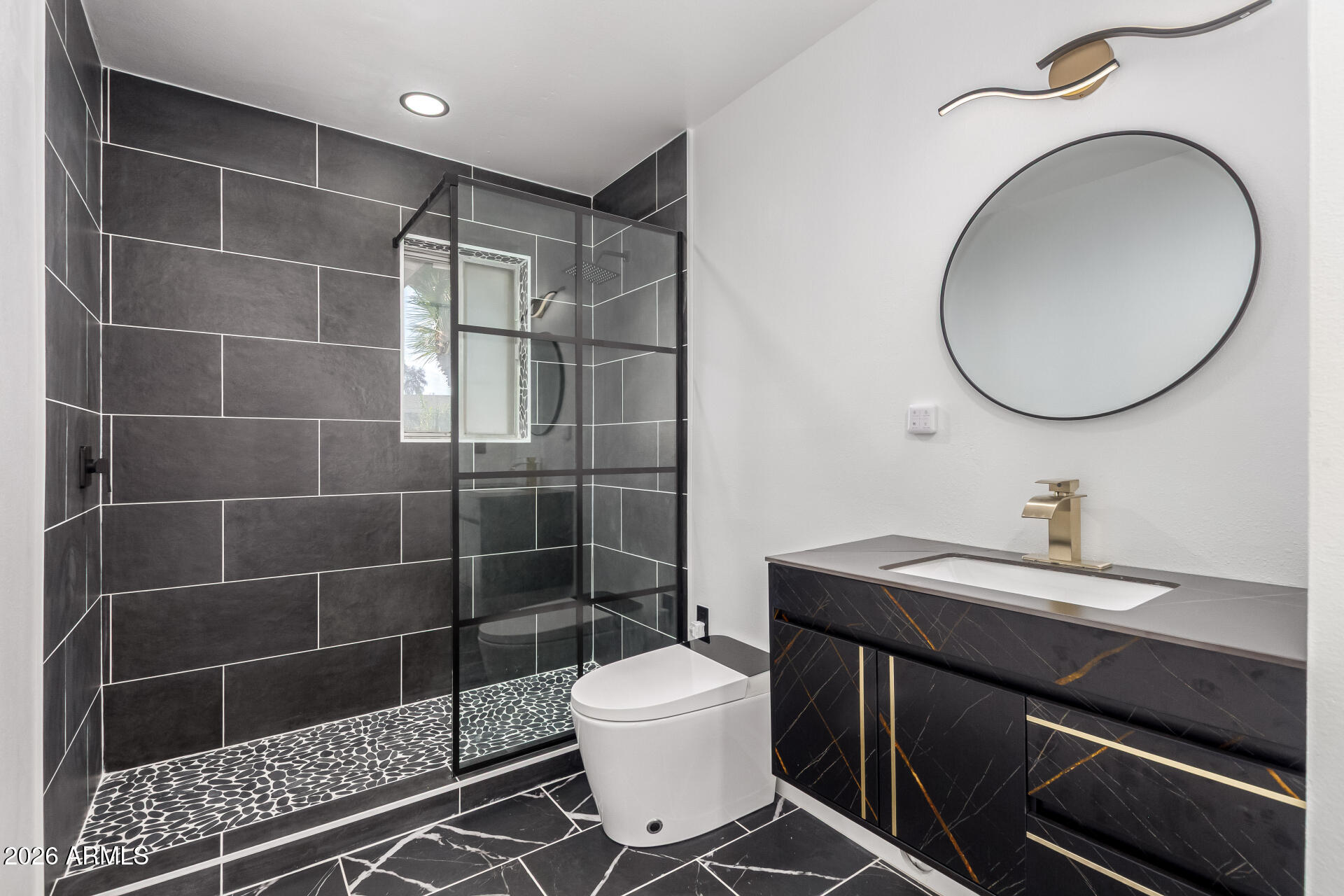 3001 West Ocotillo Road Phoenix, AZ 85017 - Photo 30 of 42 a bathroom with a sink toilet and a mirror