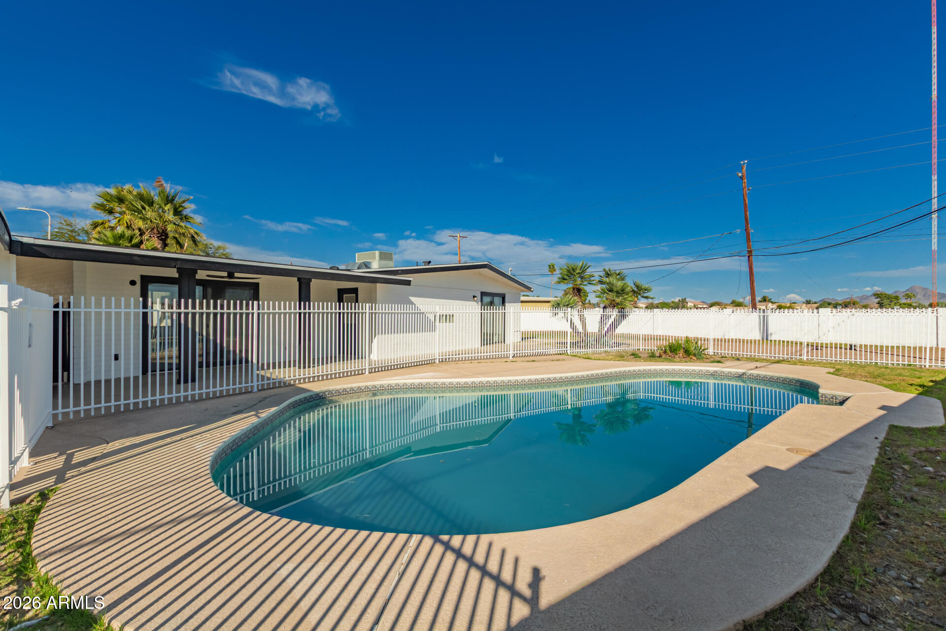 3001 West Ocotillo Road Phoenix, AZ 85017 - Photo 39 of 42 a view of a swimming pool with a chairs