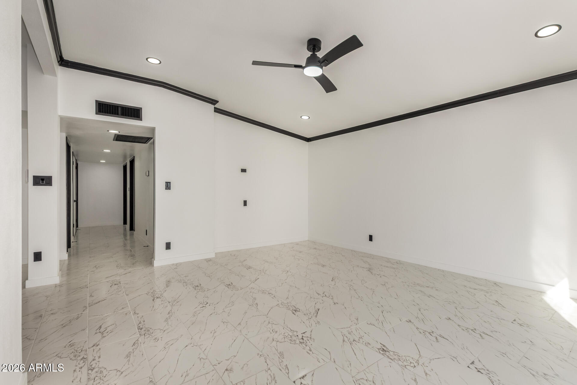 3001 West Ocotillo Road Phoenix, AZ 85017 - Photo 9 of 42 a view of a livingroom with a ceiling fan & entryway
