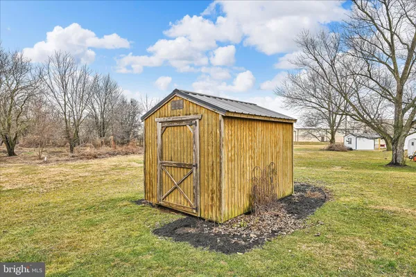 a view of a backyard with garden