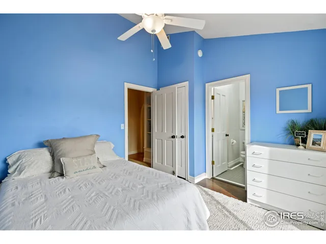 a view of hallway with wooden floor