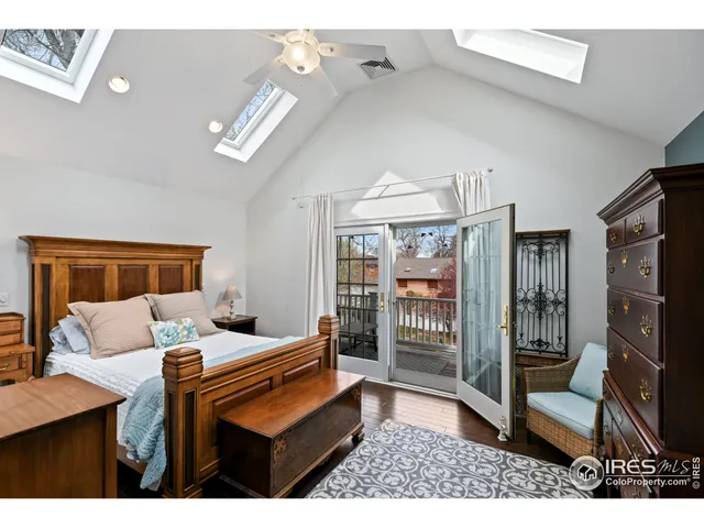 a balcony with chairs and a couch