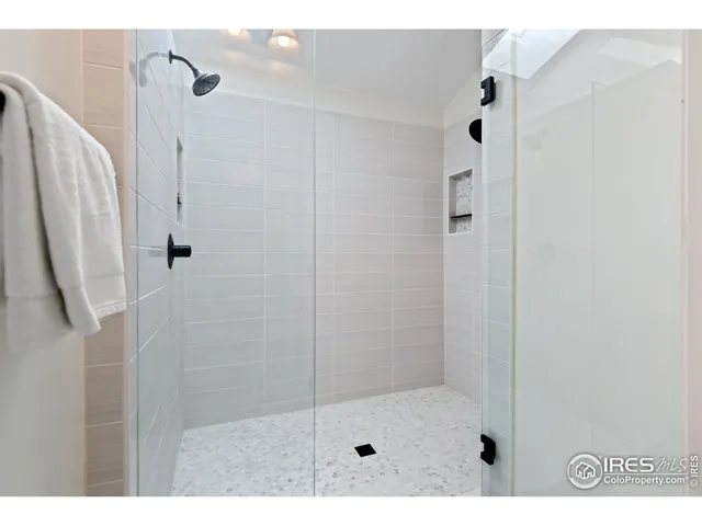 a view of a backyard with sitting area