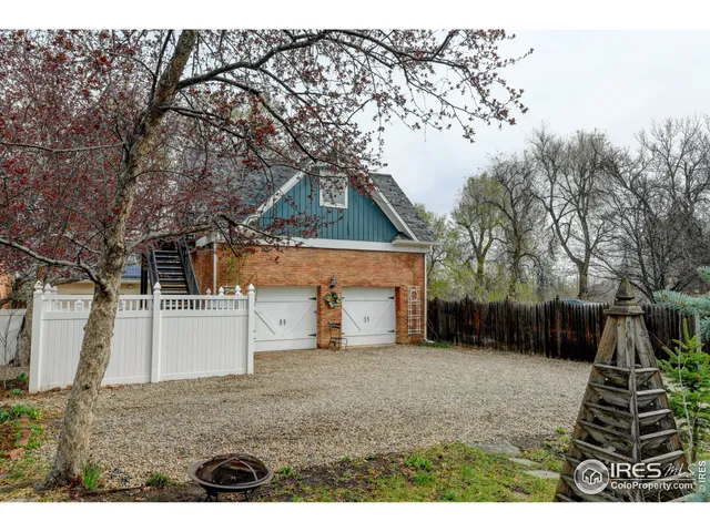 a view of balcony with lots of frames and trees