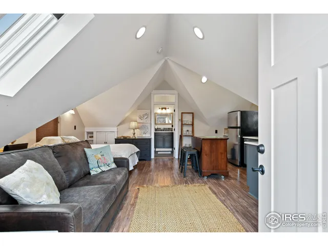 a view of a kitchen with a sink washer and dryer
