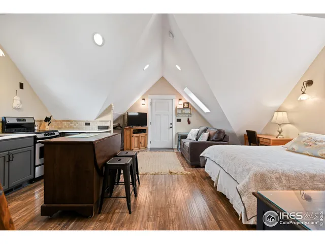 a front view of a house with a yard garage and garage