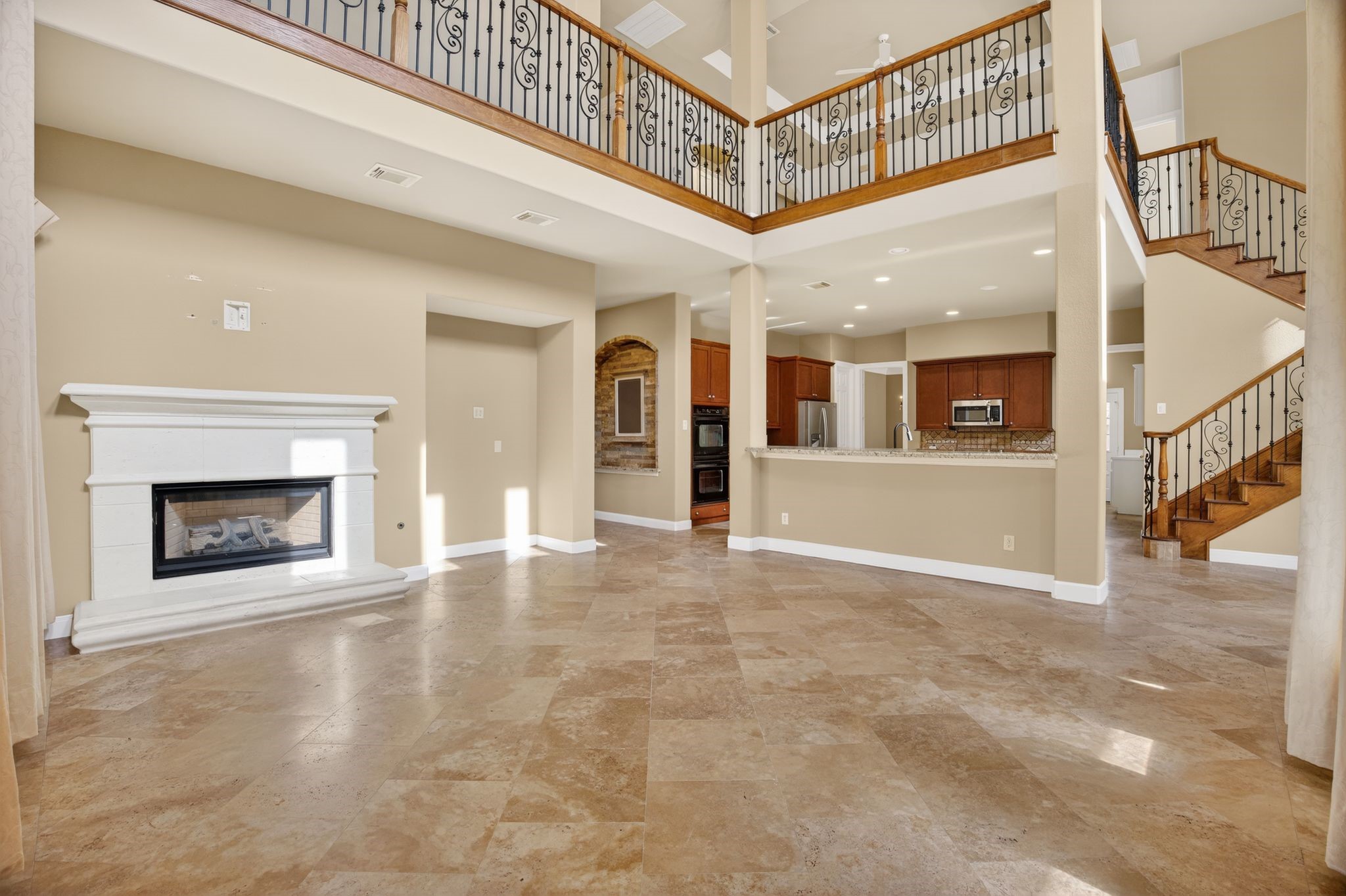 11511 Gallant Ridge Lane Houston, TX 77082 - Photo 15 of 49 a view of an entryway with a fireplace
