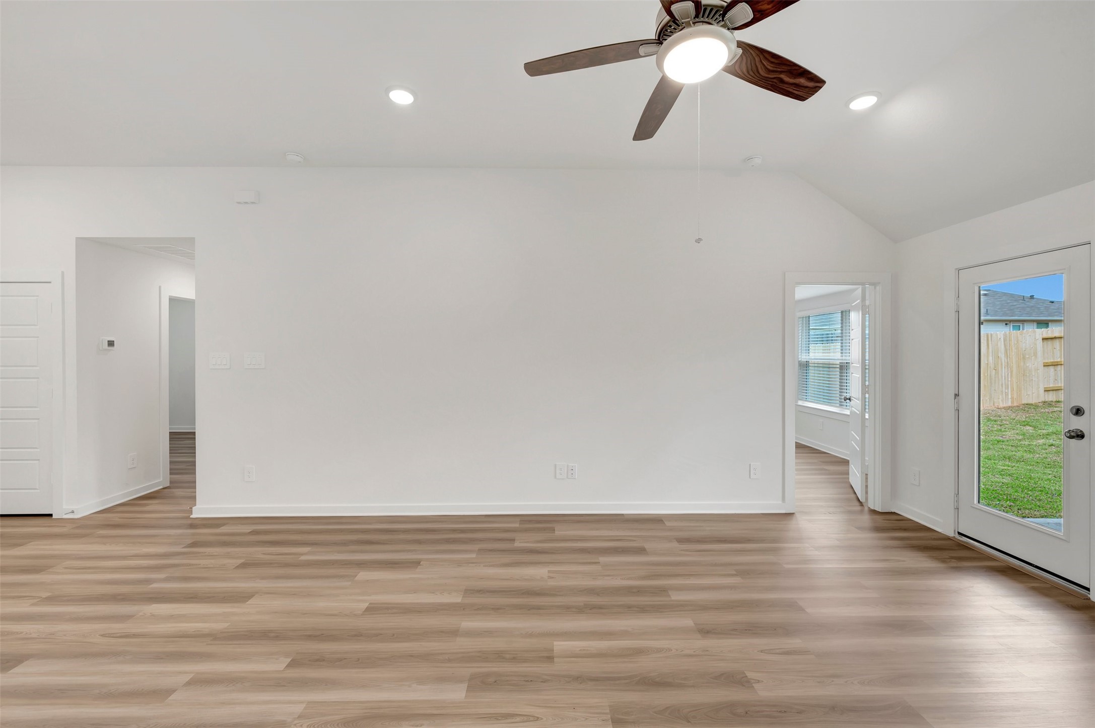 543 Flower Reed Court Magnolia, TX 77354 - Photo 33 of 46 a view of an empty room with wooden floor and window