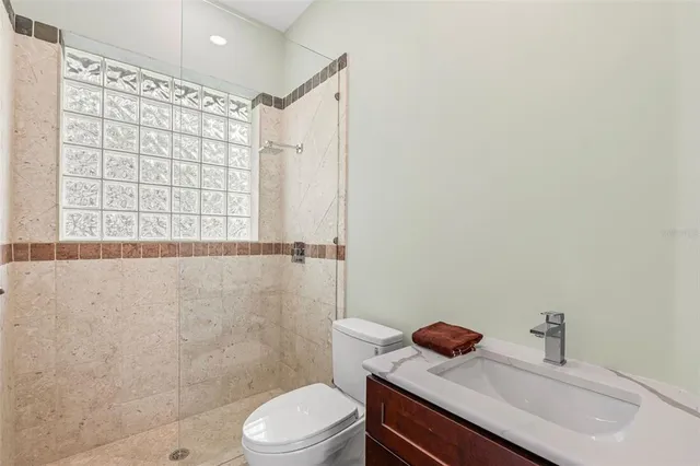 a swimming pool with trees in the background