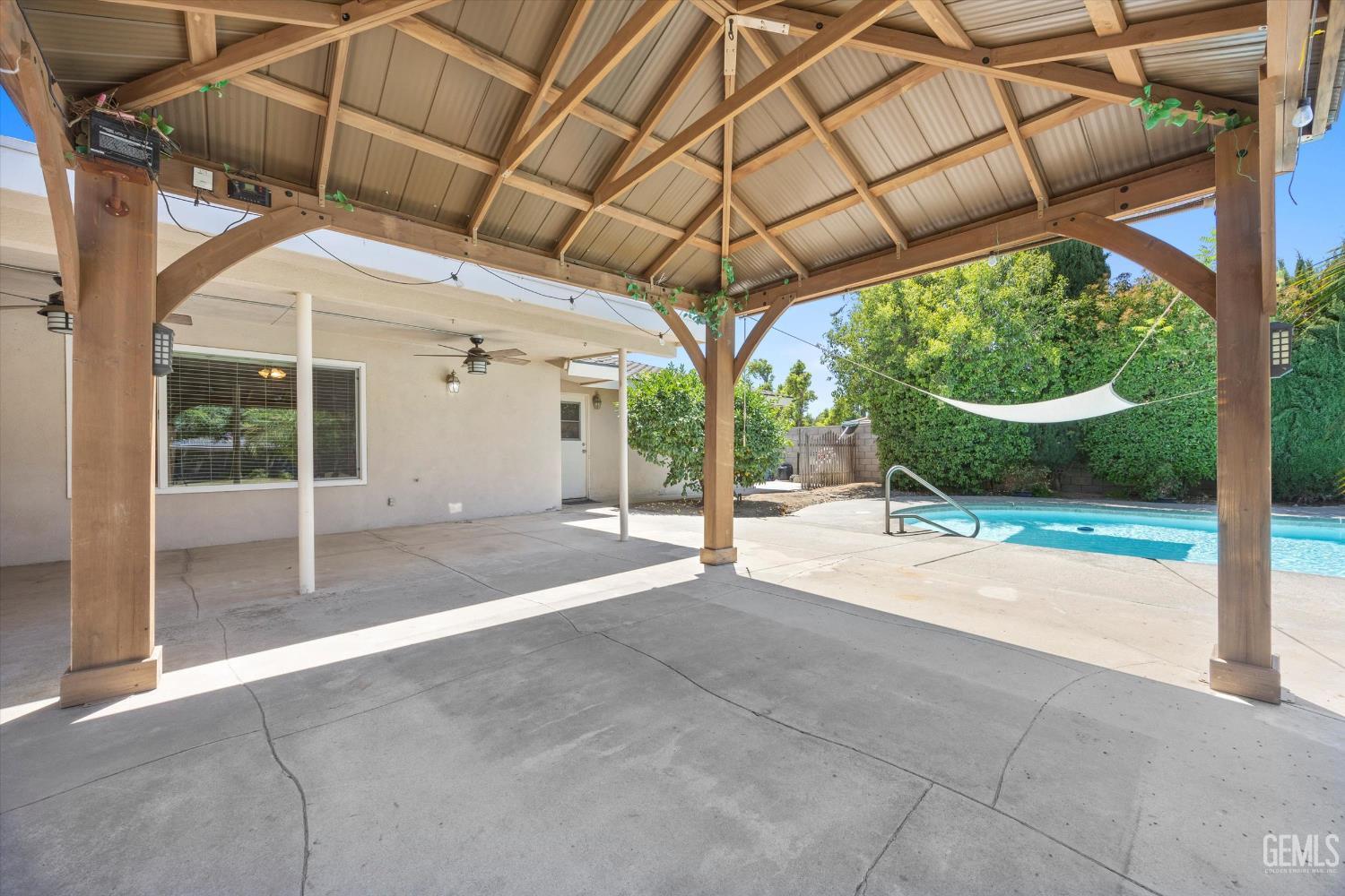 Undisclosed Address Bakersfield, CA 93308 - Photo 11 of 50 a view of a backyard of a house