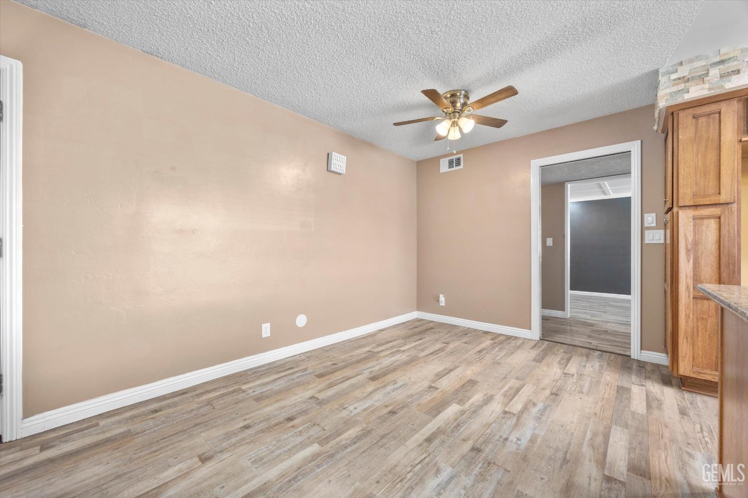 Undisclosed Address Bakersfield, CA 93308 - Photo 25 of 50 a view of an empty room with a window