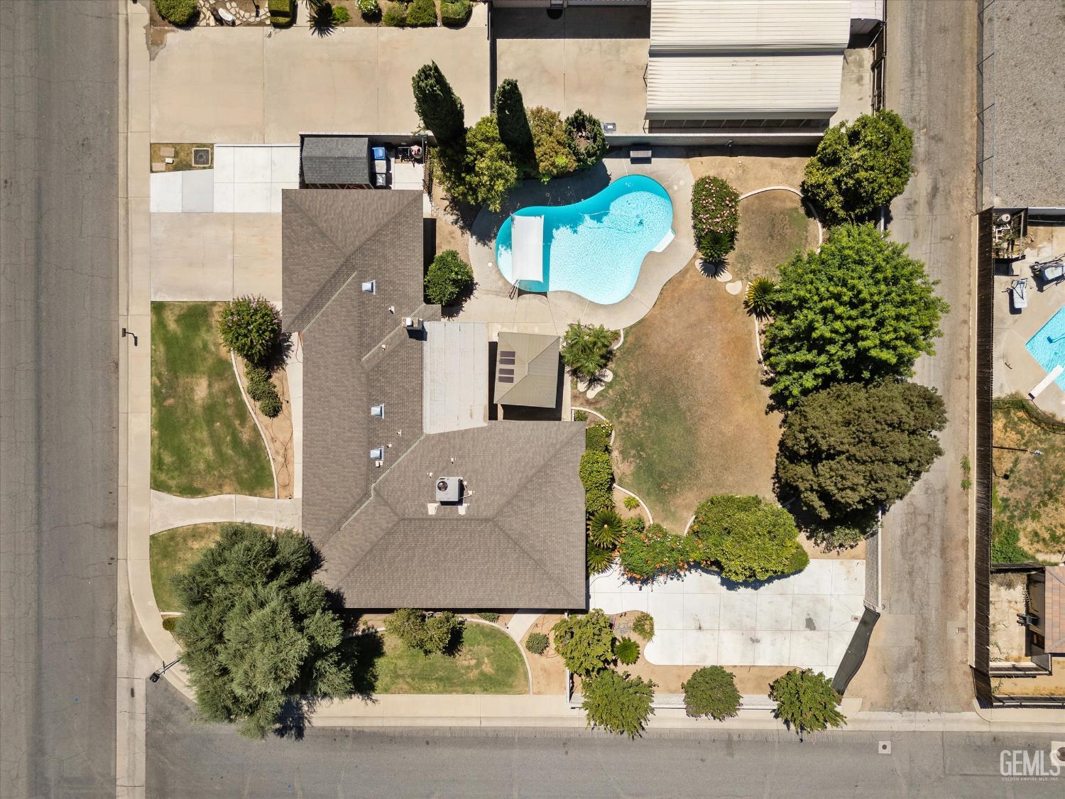 Undisclosed Address Bakersfield, CA 93308 - Photo 50 of 50 an aerial view of a house with yard and swimming pool