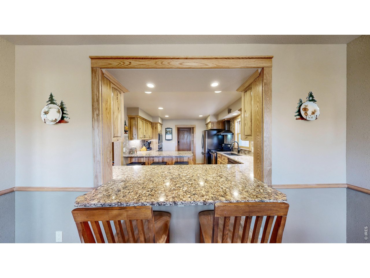 2619 Ridge Lane Estes Park, CO 80517 - Photo 11 of 48 Bar Style Window Connecting the Dining Room and Kitchen.