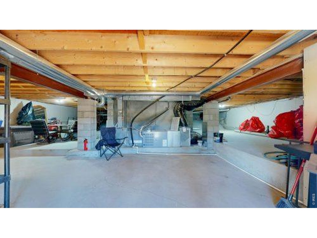 2619 Ridge Lane Estes Park, CO 80517 - Photo 34 of 50 a living room with furniture and a flat screen tv