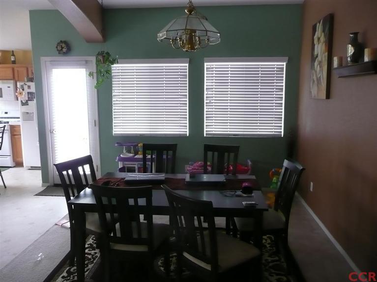 2451 Bicknell Avenue Santa Maria, CA 93458 - Photo 3 of 10 a view of a dining room with furniture and window