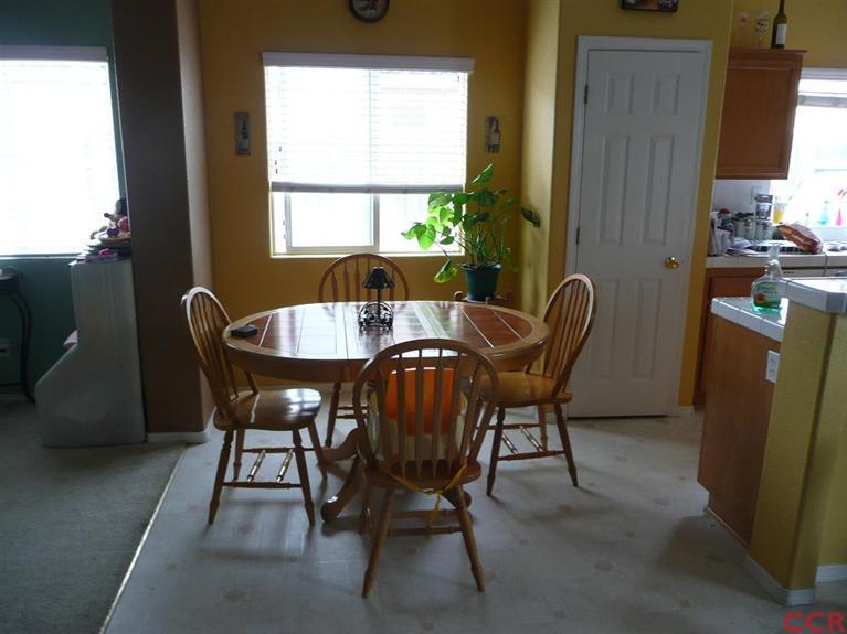 2451 Bicknell Avenue Santa Maria, CA 93458 - Photo 6 of 10 a dining room with furniture and window