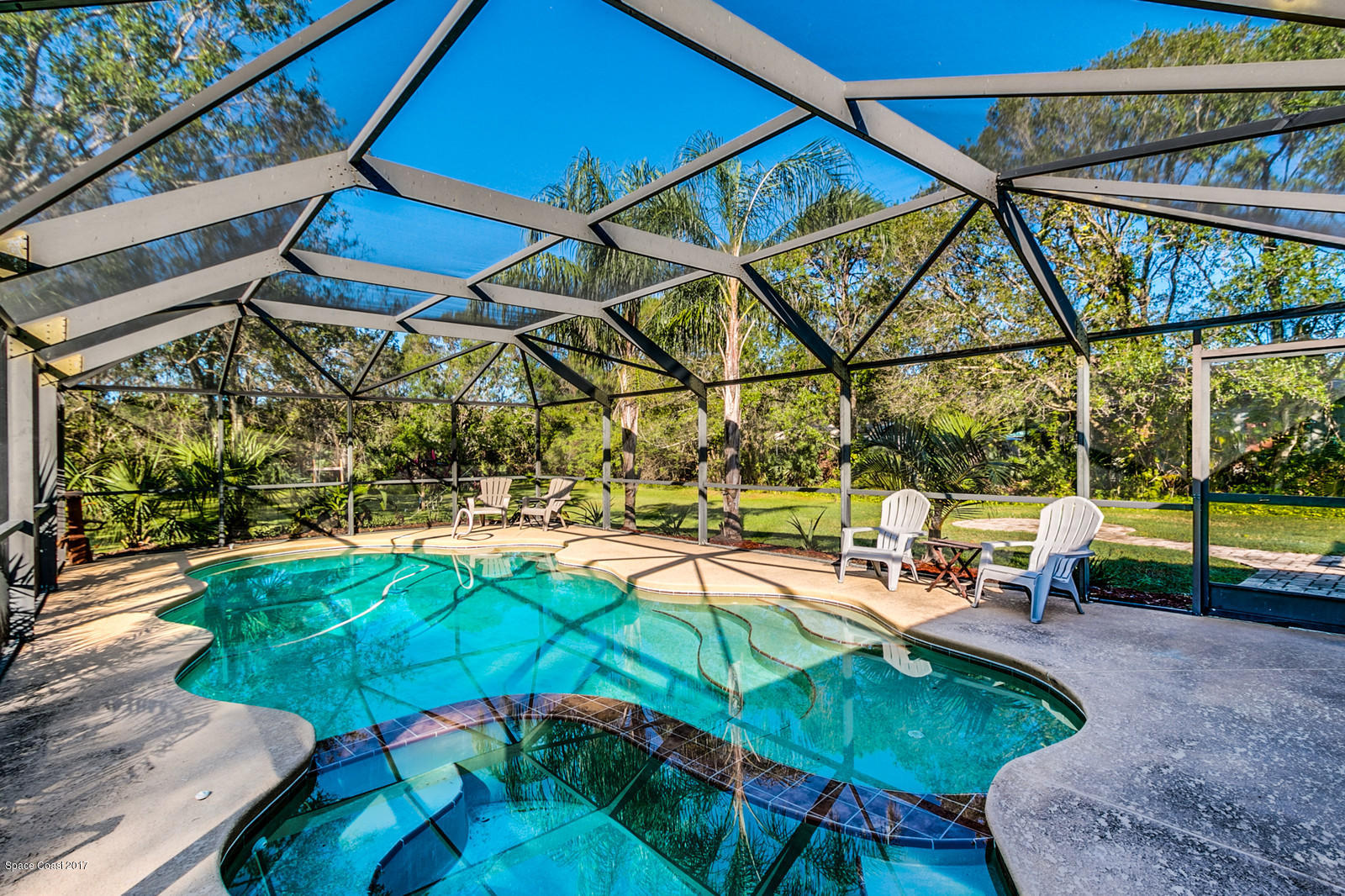 2680 Lakehill Road Melbourne, FL 32934 - Photo 22 of 37 Free Form Pool with Hot Tub
