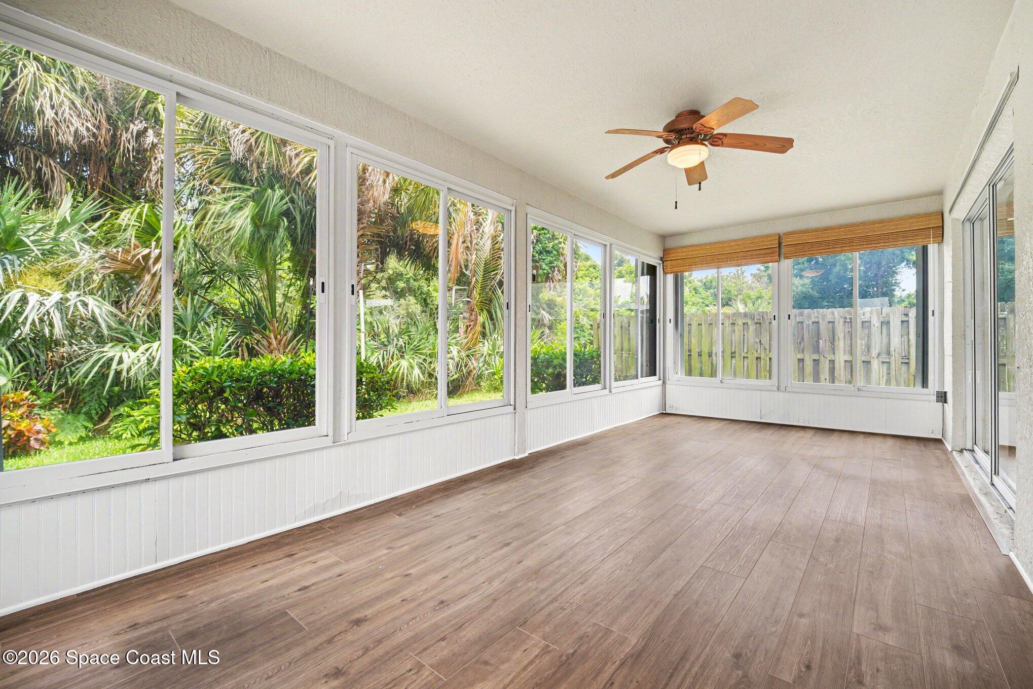 2194 Spring Creek Circle Palm Bay, FL 32905 - Photo 22 of 40 Back Patio.Screened & Slide Windows