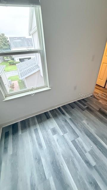 13718 Beckman Drive Windermere, FL 34786 - Photo 16 of 20 a view of an empty room with a window