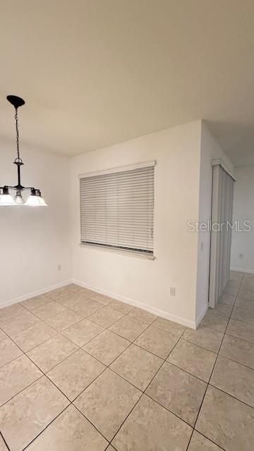 13718 Beckman Drive Windermere, FL 34786 - Photo 5 of 20 a view of an empty room with a window