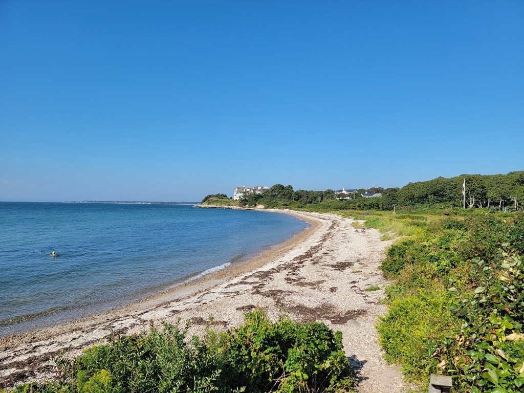 46 Gunning Point Road, Unit 2 Falmouth, MA 02540 - Photo 23 of 29 a view of a lake with a beach