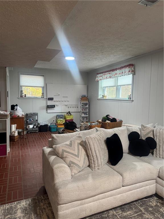 1455 Timberlane Road Snellville, GA 30078 - Photo 13 of 25 a living room with furniture and a flat screen tv