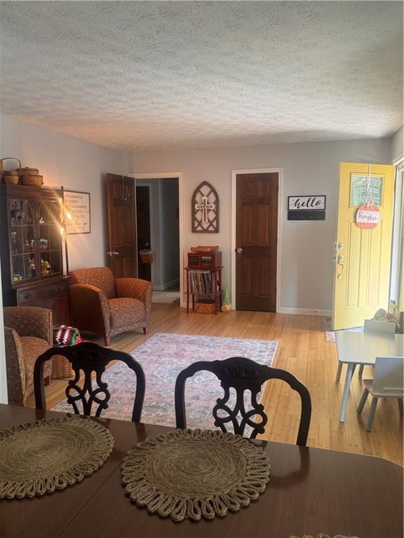 1455 Timberlane Road Snellville, GA 30078 - Photo 4 of 25 a living room with furniture and a flat screen tv